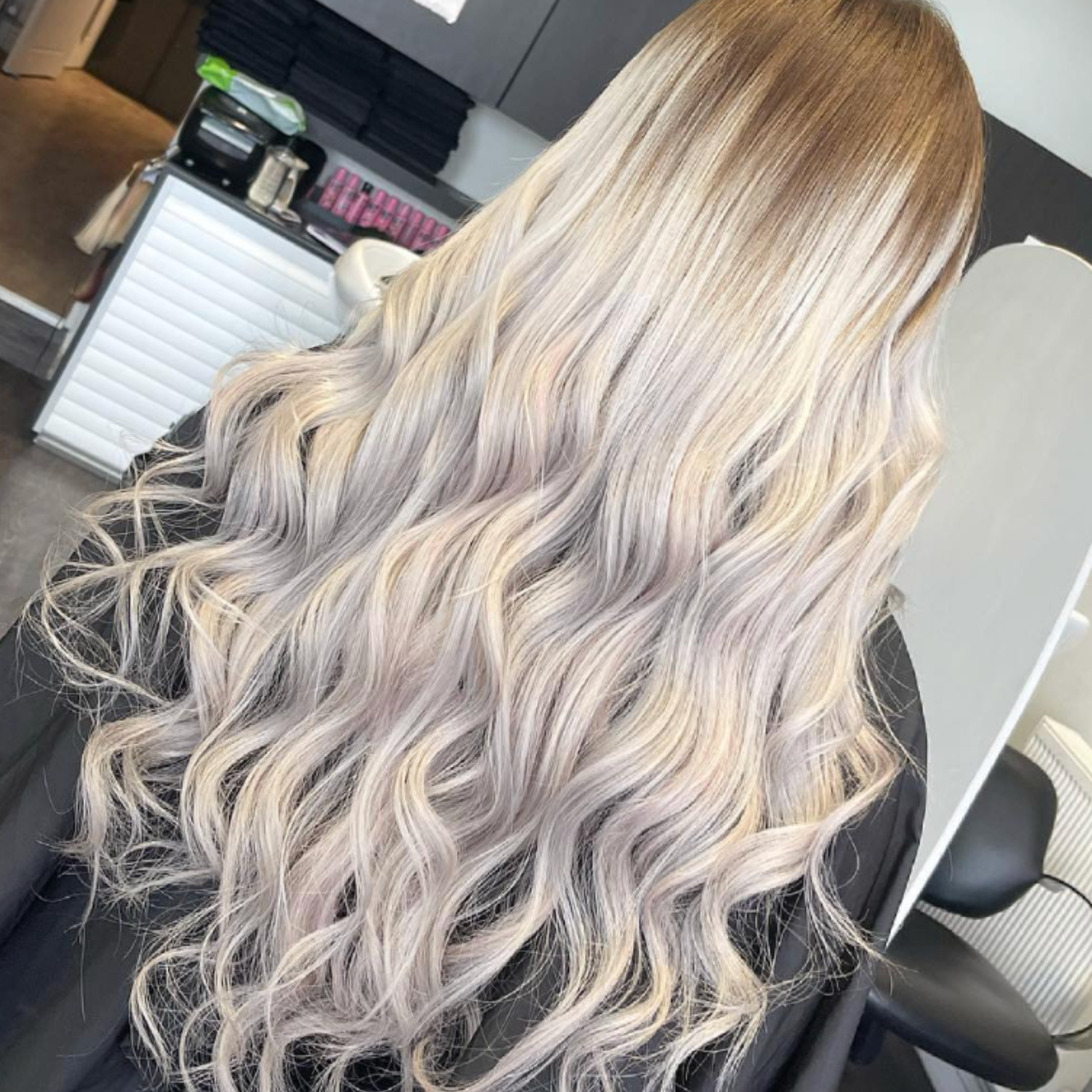 "customer wearing hair rehab london 18" weft hair extensions shade rooted blonde af"