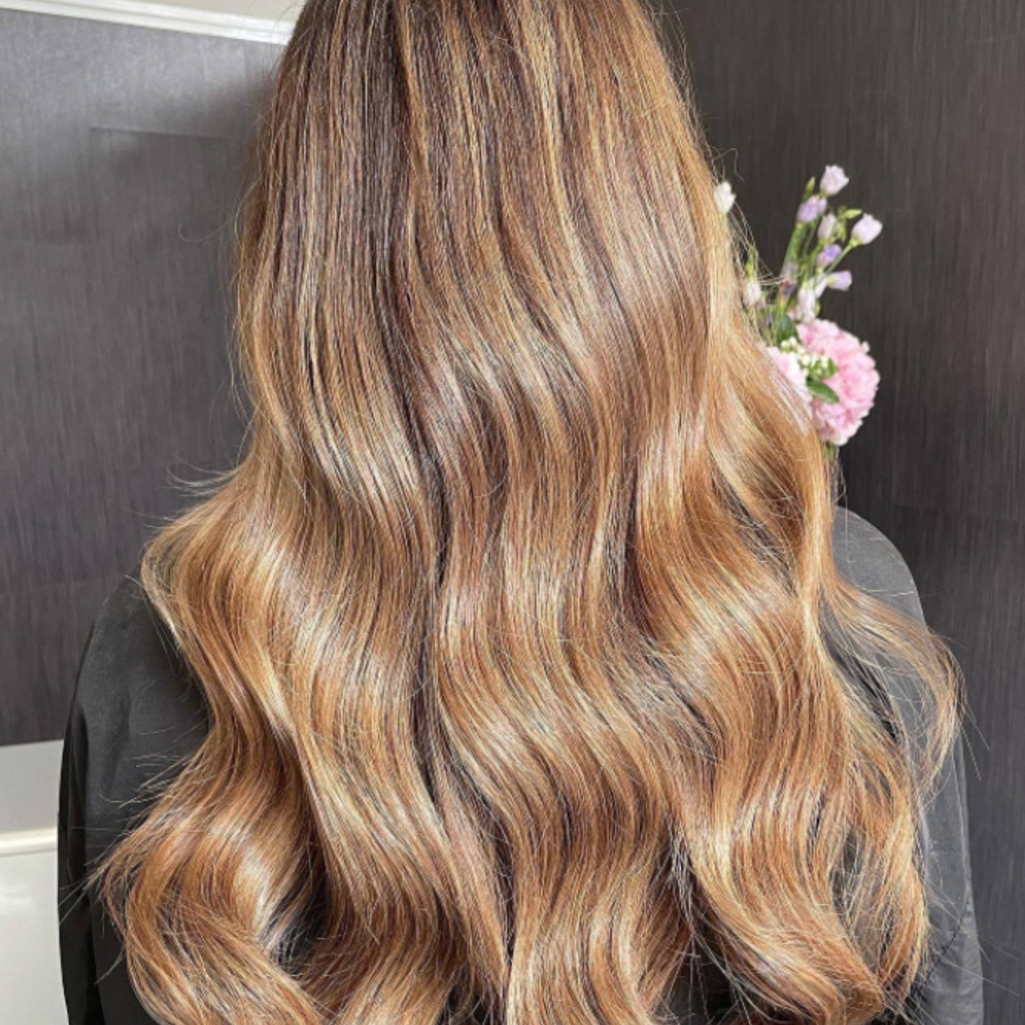 "customer wearing hair rehab london 14" tape hair extensions shade rooted bronze"